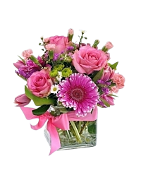Pink Market Style Flower arrangement in a glass cube, perfect for baby girl