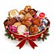 Christmas gluten-free bakery gift basket with cookies, brownies, pastries and a red-and-gold bow