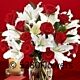 Red roses and  Local white lilies Now with more roses !!!