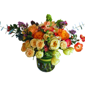 Luxury spring flower arrangement with ranunculus, garden roses, tulips, eucalyptus, and waxflower in a lush market-style design