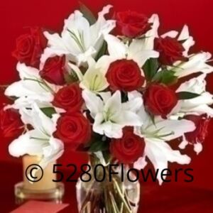 Red roses and Local white lilies Now with more roses !!!
