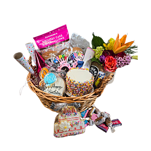 Celebration Extravaganza Birthday Basket with cookies, cake, chocolates, and festive items