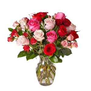 Mixed Pink rose arrangement with fillers and greens