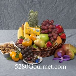 Fruits, nuts and chocolate basket