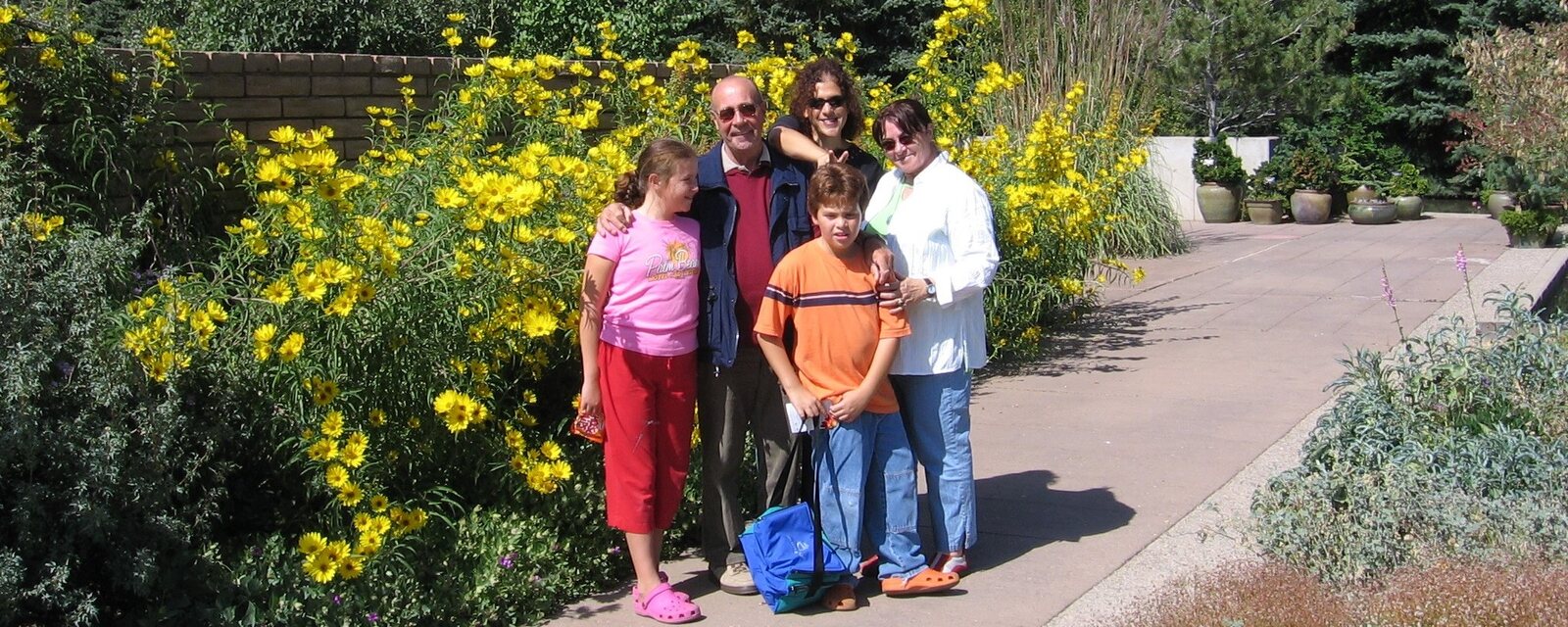 The Kops family together in a colorful flower garden
